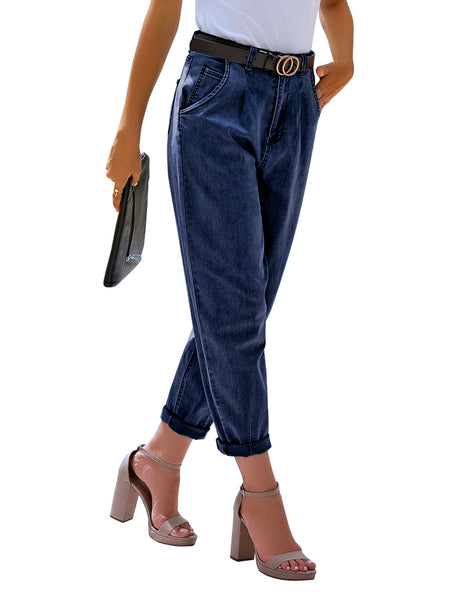 Side view of model wearing deep blue high-waist loose denim mom jeans