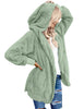 Angled view of model wearing Sage Green Snuggle Oversized Hooded Cardigan