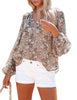 Front view of model wearing grey long sleeves V-neckline floral-print boho blouse