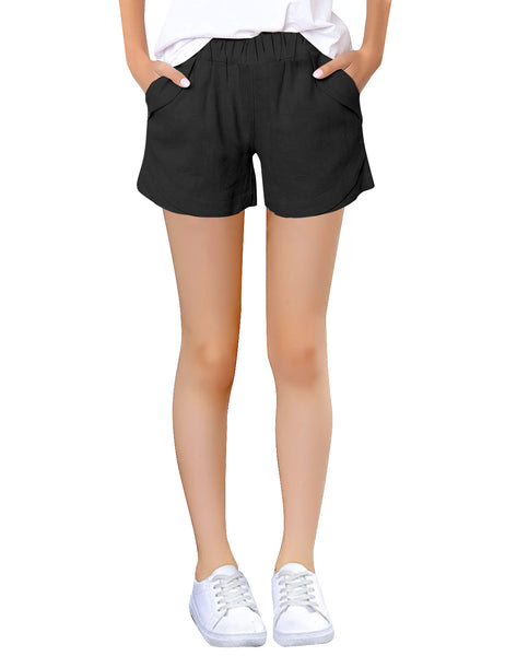 Close-up view of model wearing black elastic-waist girls' plain summer shorts