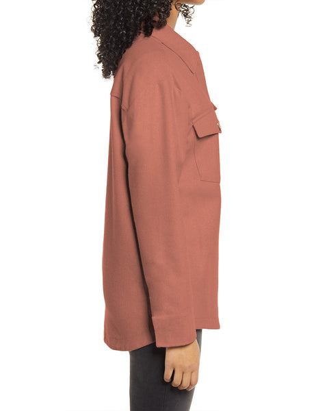 Side view of model wearing Rust Red Long Sleeves Button Down Shirt Jacket