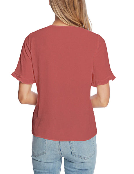 Back view of model wearing dark blush ruffle trim short sleeves V-neck button-down top
