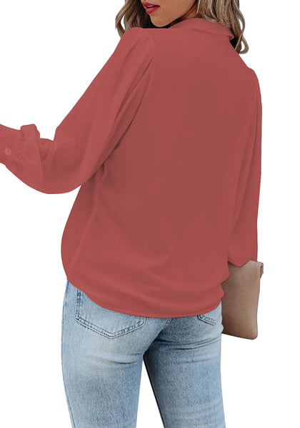 Back view of model wearing dark blush lantern sleeves button-down pleated chiffon top