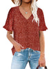 Model wearing rust red ruffle trim short sleeves printed V-neck button-down top