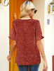 Back view of model wearing rust red ruffle trim short sleeves printed V-neck button-down top