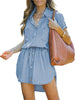 Model wearing light blue elastic waist curved hem button down denim shirt dress
