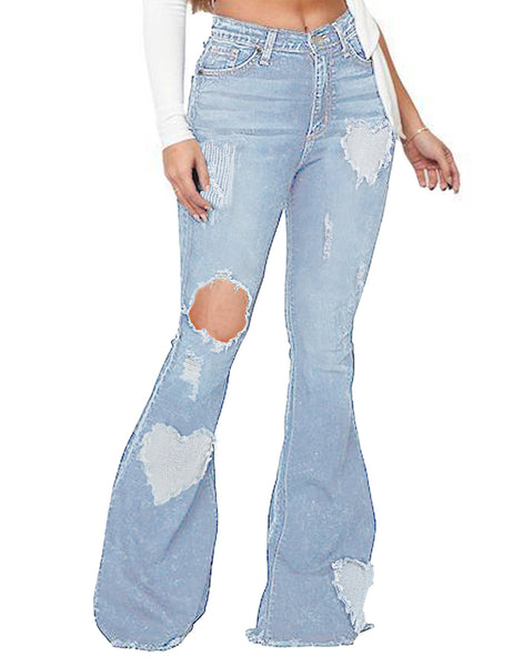 Front view of model wearing light blue mid-waist ripped heart flared denim jeans