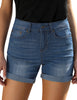 Front view of model wearing blue rolled hem slim fit denim shorts