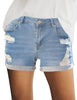 Model wearing light blue mid-waist rolled hem distressed denim shorts