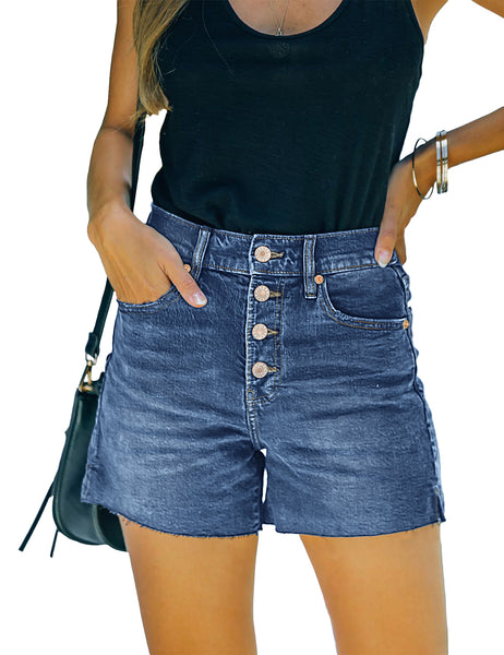 Front view of model wearing blue raw hem mid-waist distressed denim shorts