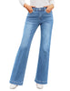 Model wearing light blue mid-waist stretchable straight leg denim jeans