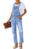 Front view of model wearing blue straight cut distressed denim jeans overall