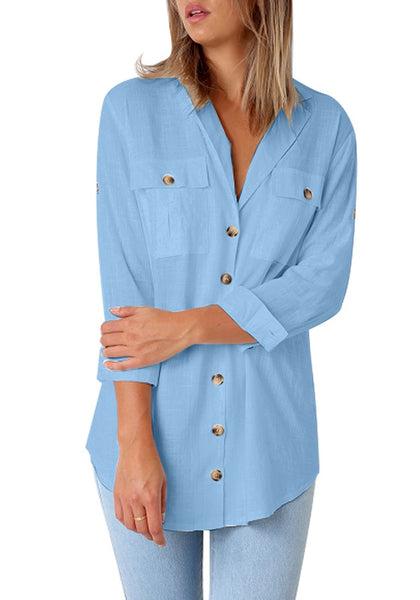 Model poses wearing light blue long cuffed sleeves lapel button-up blouse
