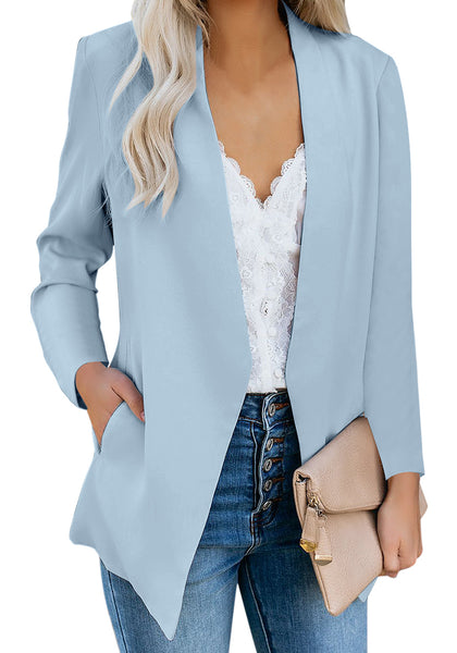 Model poses wearing light blue open-front side pockets blazer
