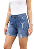 Side view of model wearing light blue rolled hem mid-waist distressed denim shorts