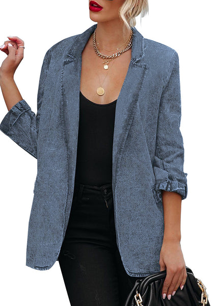 Front view of model wearing blue lapel collar flap pockets open-front denim blazer