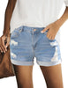 Front view of model wearing light blue mid-waist rolled hem distressed denim shorts