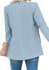 Back view of model wearing light blue open-front side pockets blazer