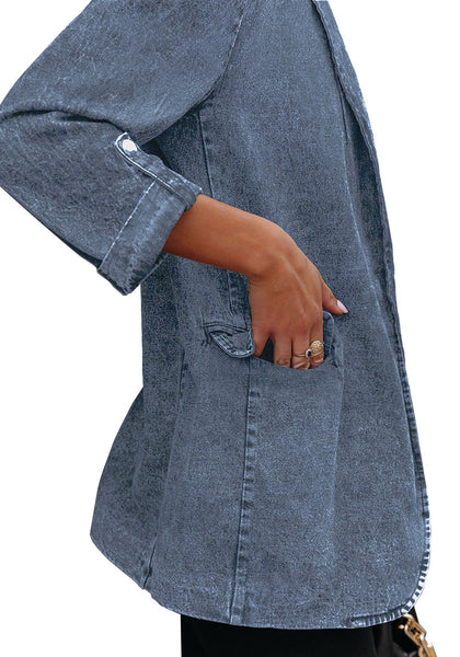 Side view of model wearing blue lapel collar flap pockets open-front denim blazer