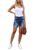 Full front view of model wearing blue rolled hem mid-waist distressed denim shorts