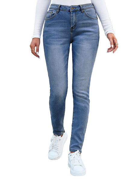 Front view of model wearing dark blue mid-waist skinny fit denim jeans