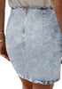 Back view of model wearing grey acid wash tulip ruched denim mini skirt
