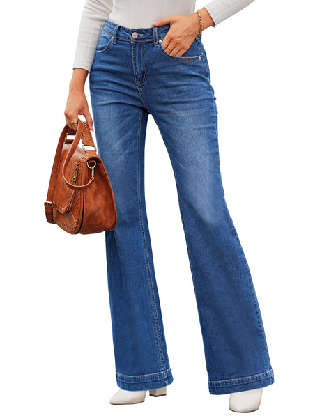 Model poses wearing blue mid-waist stretchable straight leg denim jeans