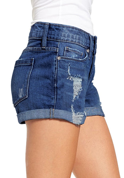 Side view of model wearing blue roll-over hem double button distressed denim shorts