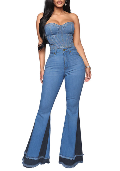 Full front view of model wearing dark blue stretchy frayed hem flared denim jeans