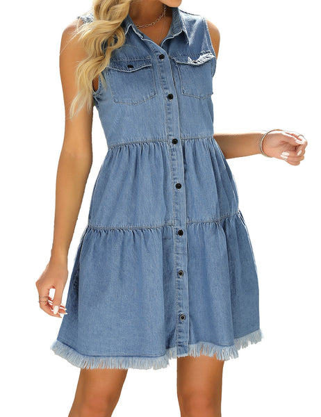 Angled shot of model wearing blue button down collar sleeveless tiered denim dress