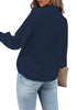 Back view of model wearing navy blue lantern sleeves button-down pleated chiffon top