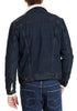 Back view of model wearing Men's Deep Blue Fleece Lapel Button Down Denim Jacket