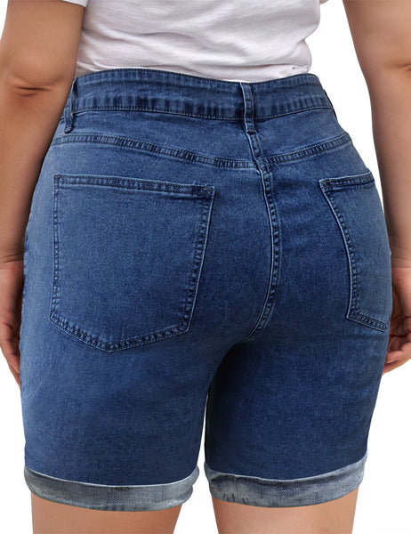Back view of model wearing blue high-waist cuffed hem distressed denim biker shorts
