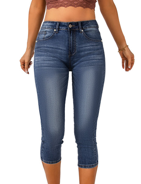 Front view of model wearing blue below knee skinny fit jeans shorts