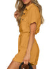 Side view of model wearing mustard short sleeves button-down belted romper