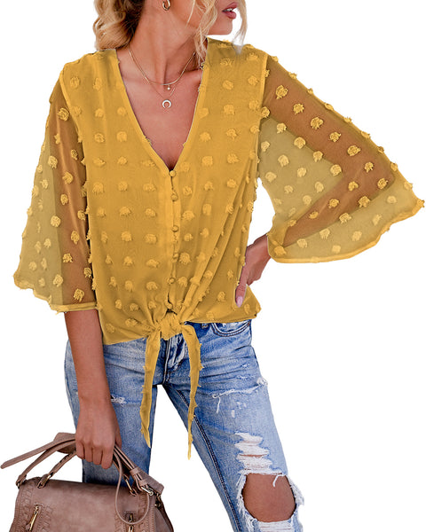 Model wearing mustard yellow 3/4 sleeves pompom tie-front top