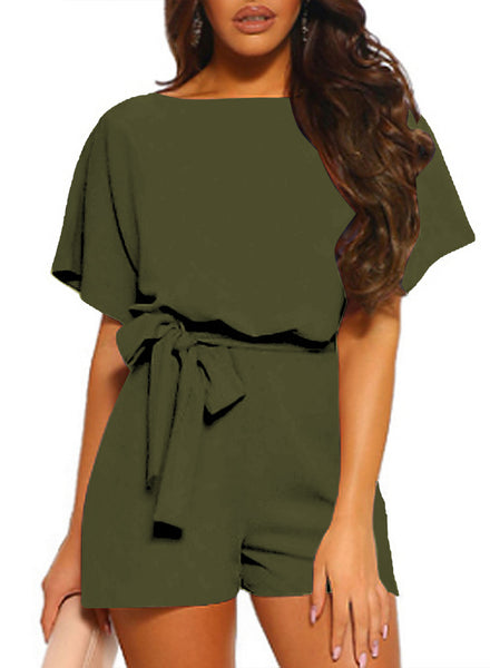 Front view of model wearing emerald green short sleeves keyhole-back belted romper