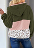 Back view of model wearing army green colorblock half-zip hooded fleece pullover