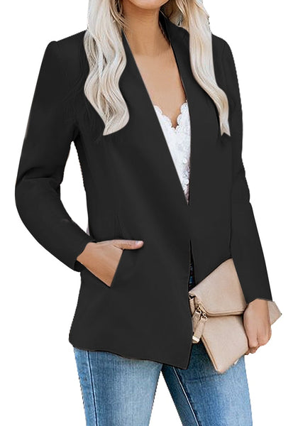 Angled shot of model wearing black open-front side pockets blazer