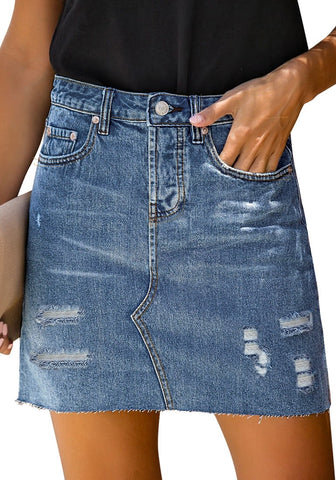 Angled shot of model wearing dark blue raw hem distressed denim mini skirt
