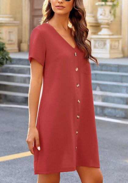Angled shot of model wearing dark coral pink V-neck button down short sleeve mini dress