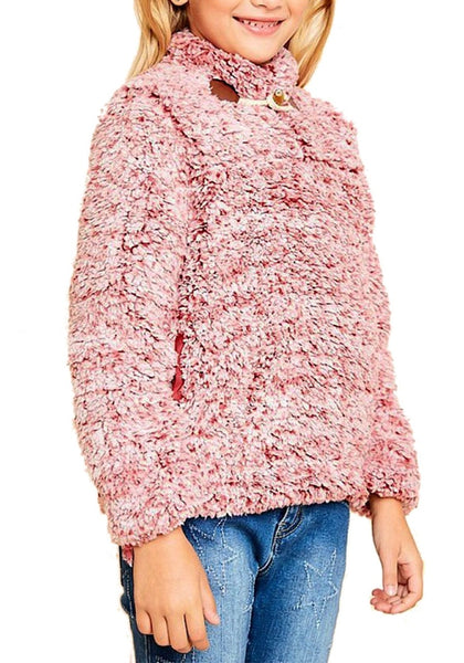 Angled shot of model wearing pink mock neck toggle buttons fleece girls sweater
