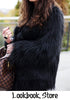 Angled side view of model black faux fur coat-