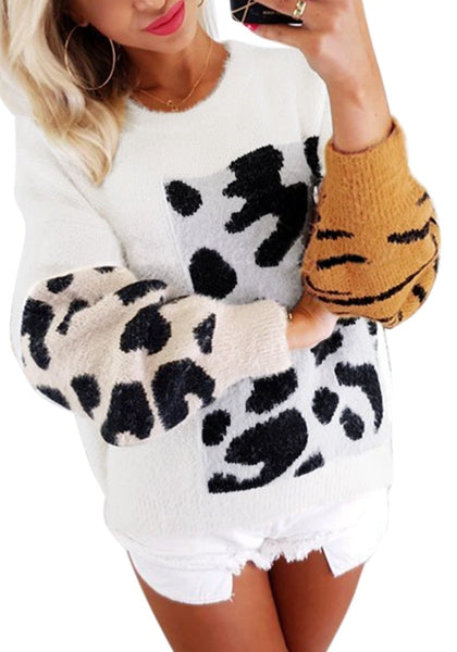 Angled view of model wearing white animal-print colorblock batwing sleeves sweater