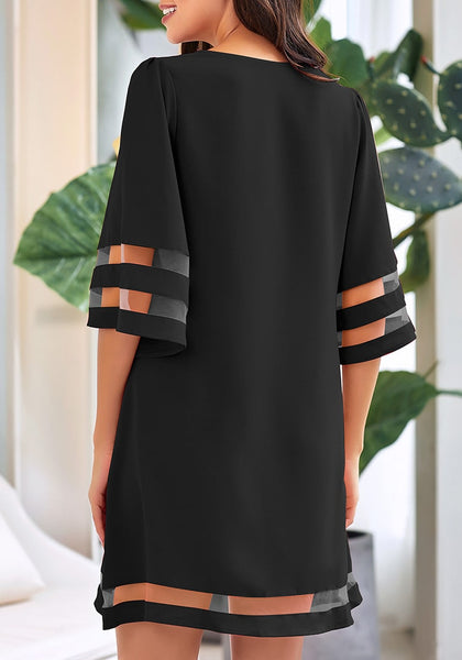 Back view of model wearing black 34 bell sleeves mesh panel crew-neckline loose dress