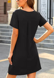Back view of model wearing black V-neck button down short sleeve mini dress
