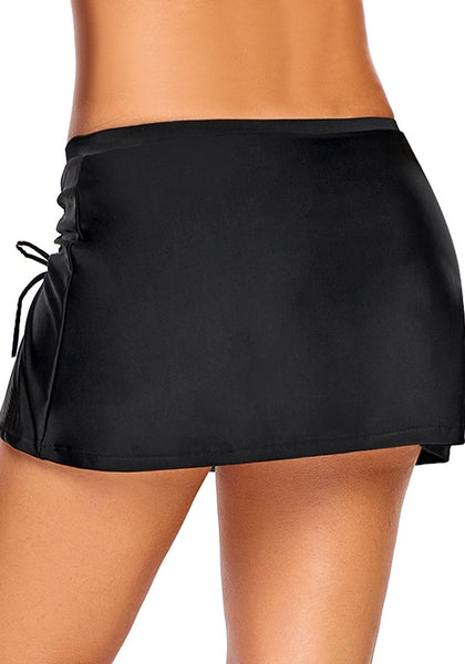 Back view of model wearing black elastic waist slit side-drawstring skirtini bottom