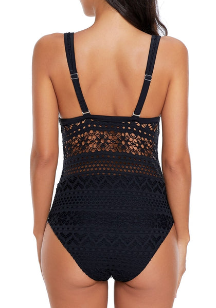 Back view of model wearing black lace crochet V-neckline swimsuit