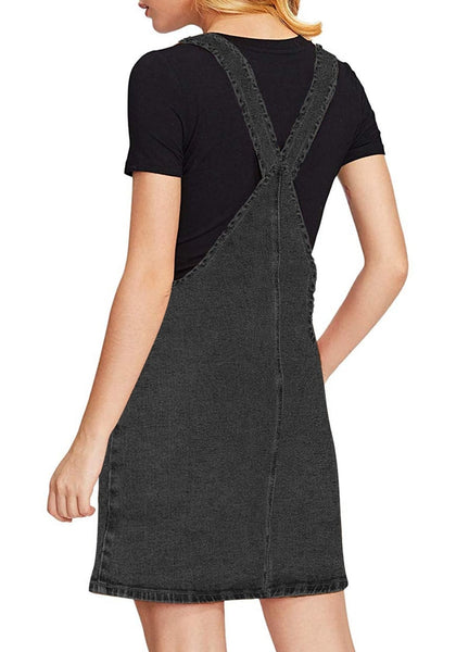 Back view of model wearing black side pockets overall denim pinafore dress