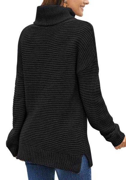 Back view of model wearing black side slit turtleneck textured knit sweater